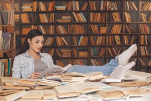 young woman study in the library alone