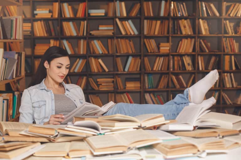 young woman study in the library alone